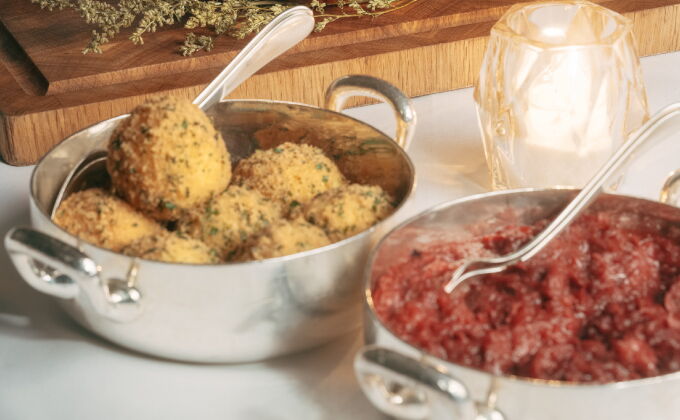 Traditional roast goose side dishes with potato dumplings and red cabbage