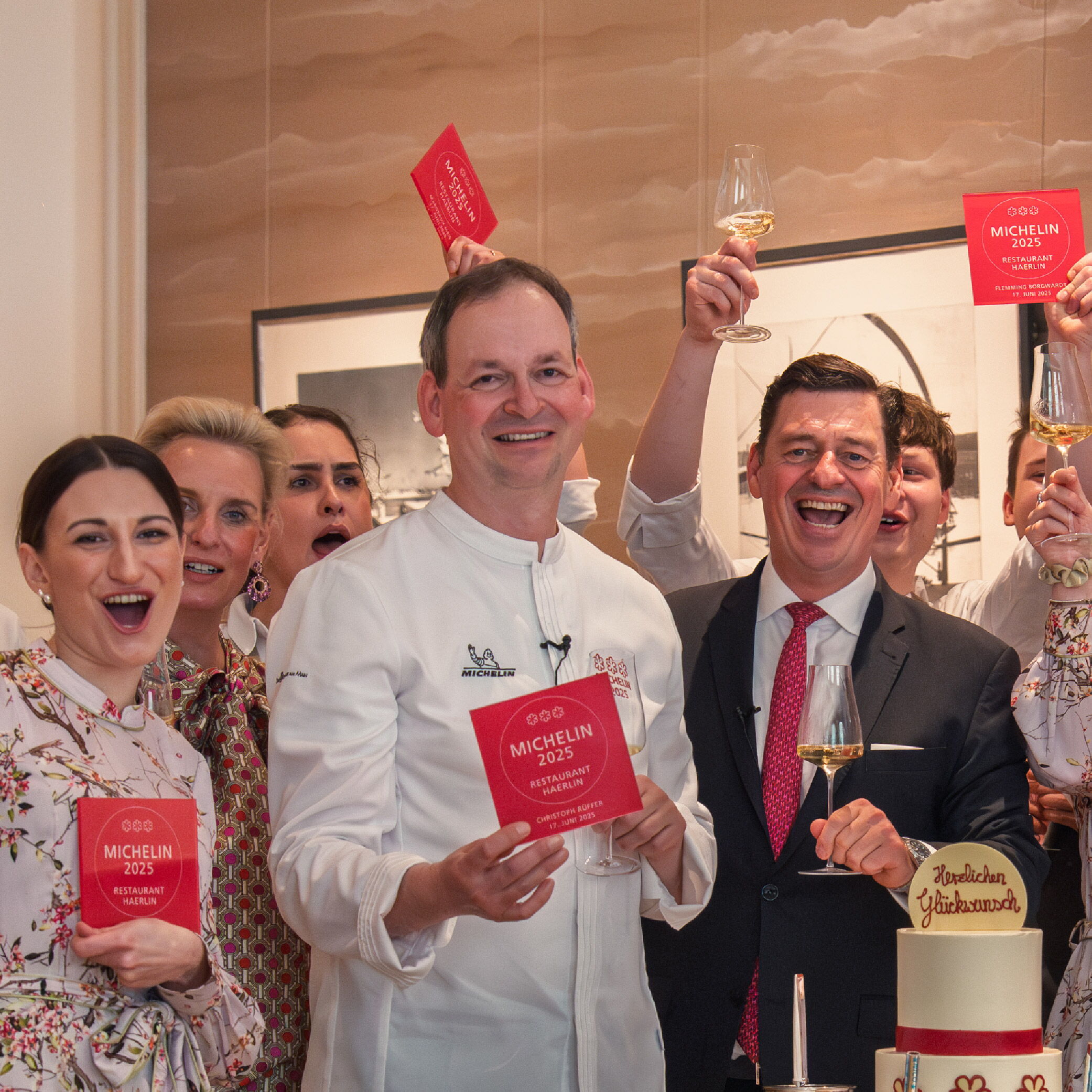 The team at Restaurant Haerlin*** with their third Michelin star award in hand.
