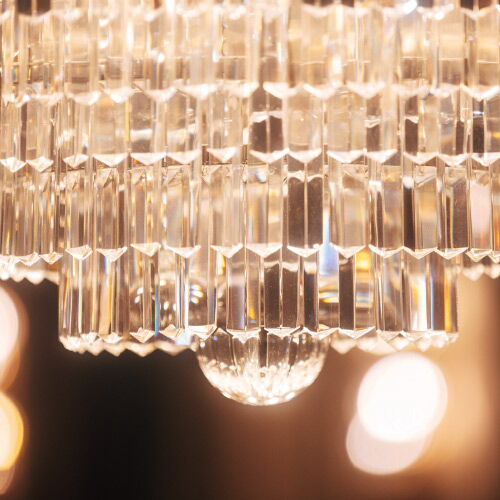 Brightly lit chandelier in the Hotel Vier Jahreszeiten