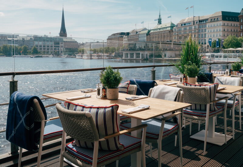 View of the laid tables with a view of the Alster and Hamburg